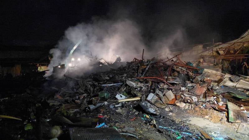 Hundreds flee as fire destroys workers' camp